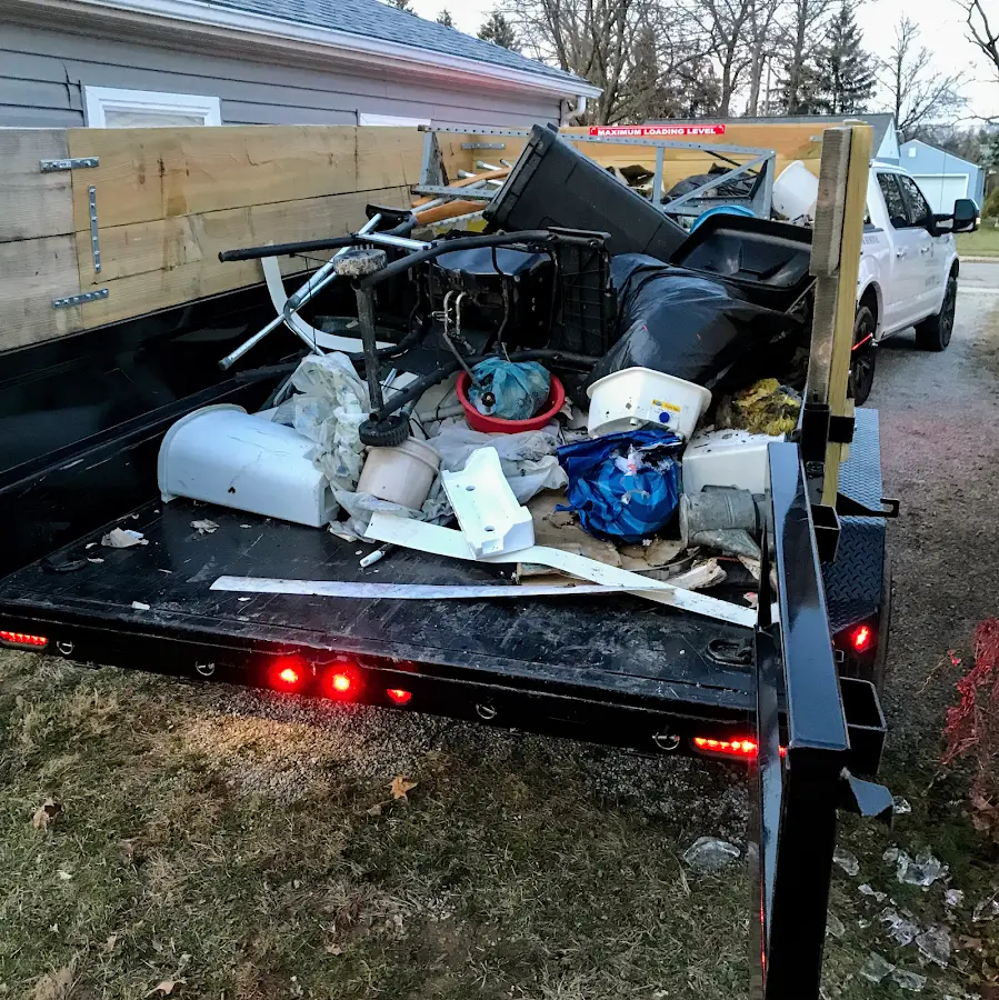 Roll-off dumpster delivered to a residential driveway in Four Corners